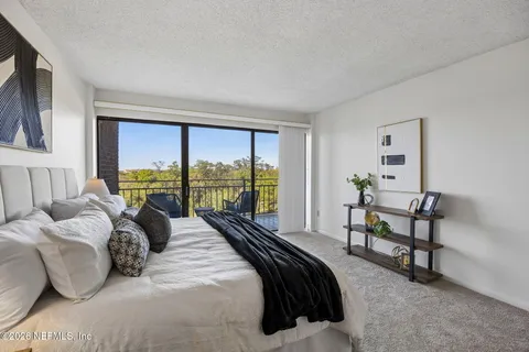 a view of a lake with a garden