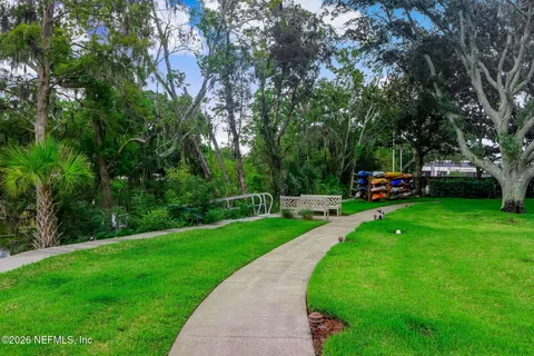 a view of a patio with couches and chairs