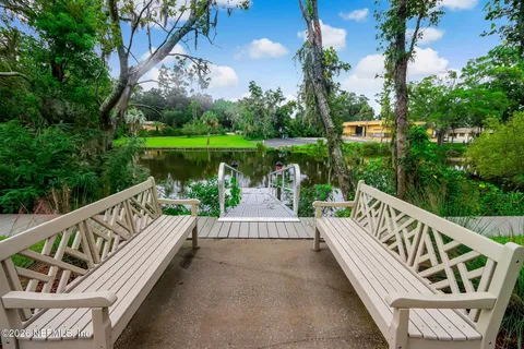 a view of a balcony with wooden floor