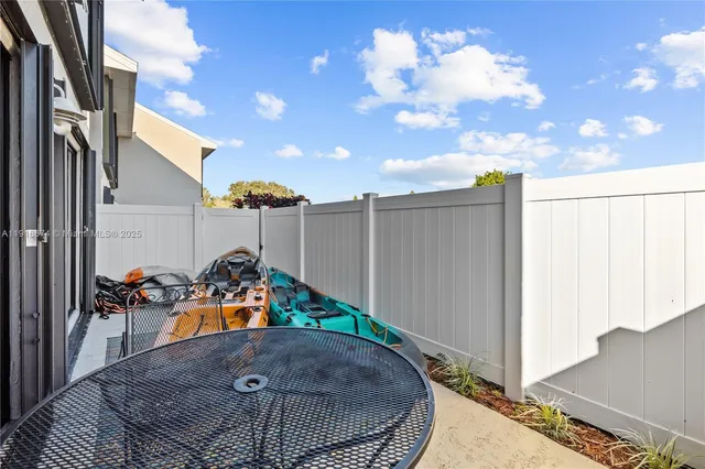 an outdoor space with furniture