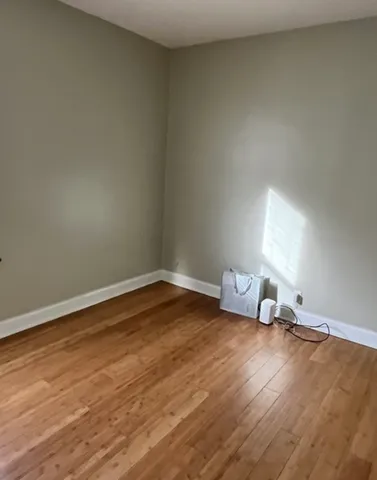 a room with bed and window