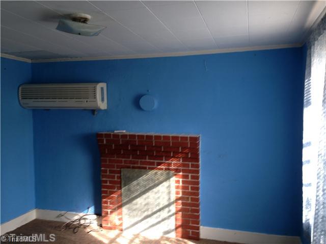 166 Pond Valley Road Ararat, NC 27007 - Photo 5 of 12 Living Room. The Klimaire Wall Unit both heats and cools the house - it is electric.