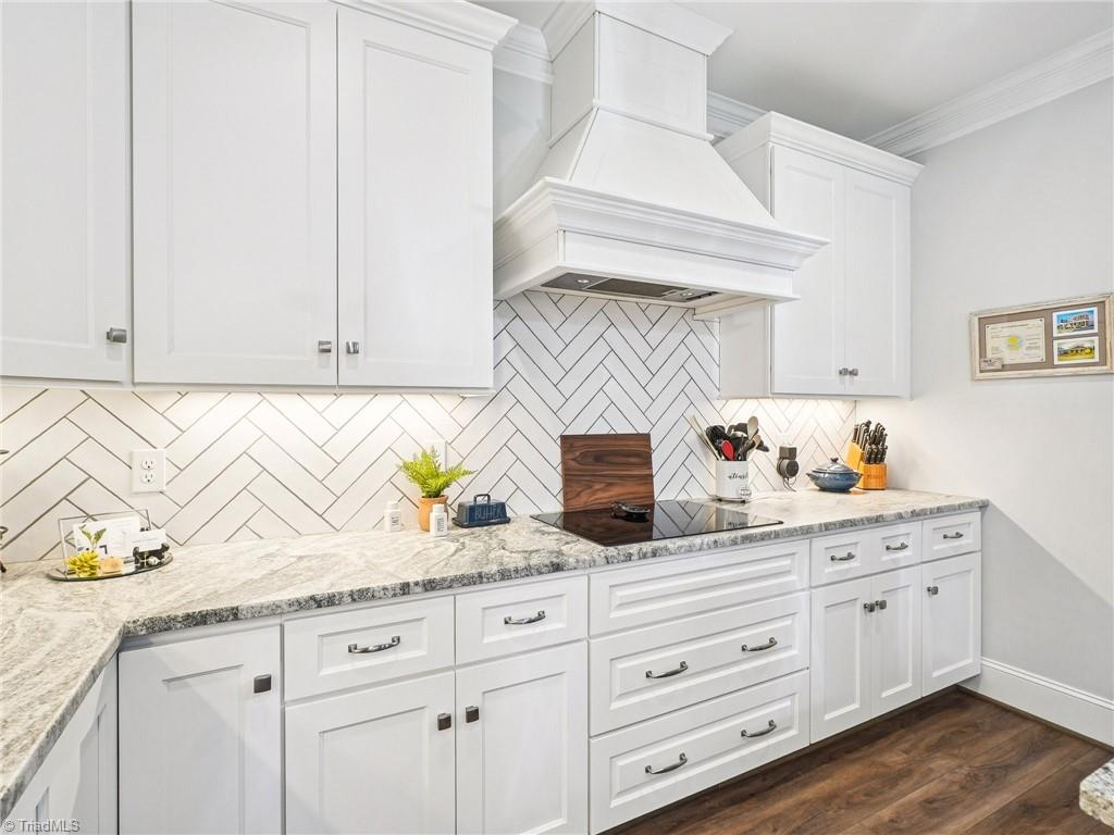 1659 Angus Ridge Drive Kernersville, NC 27284 - Photo 7 of 34 A chef's Dream Kitchen! Love the Custom Hood!