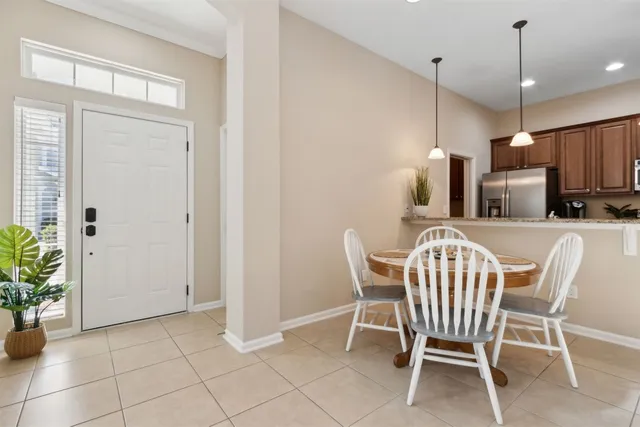 a room with furniture and flat screen tv