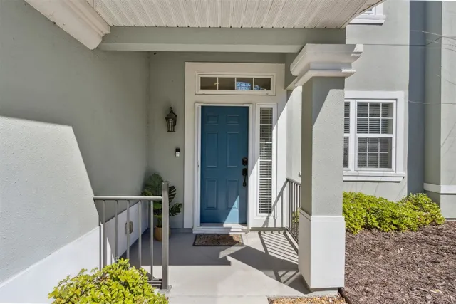 a kitchen with granite countertop a sink stove and microwave
