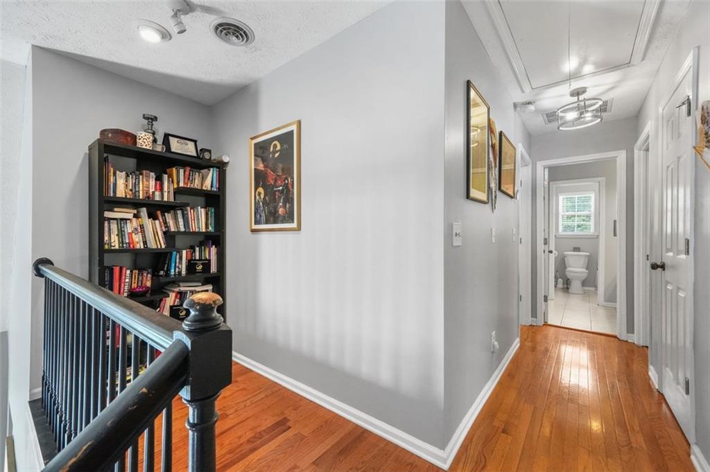 4835 Liberty Road Villa Rica, GA 30180 - Photo 29 of 72 a view of a hallway with wooden floor and entryway