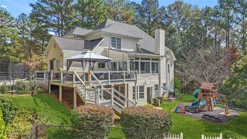 swimming pool view with a outdoor seating