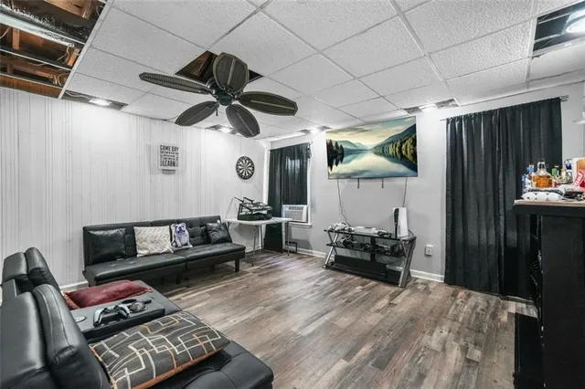 a dining room with a table and chairs