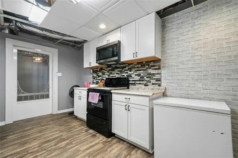 an aerial view of house with yard