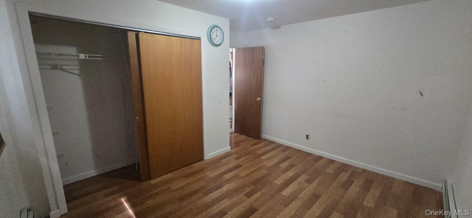 51 Peconic Street Selden, NY 11784 - Photo 16 of 16 a view of an empty room