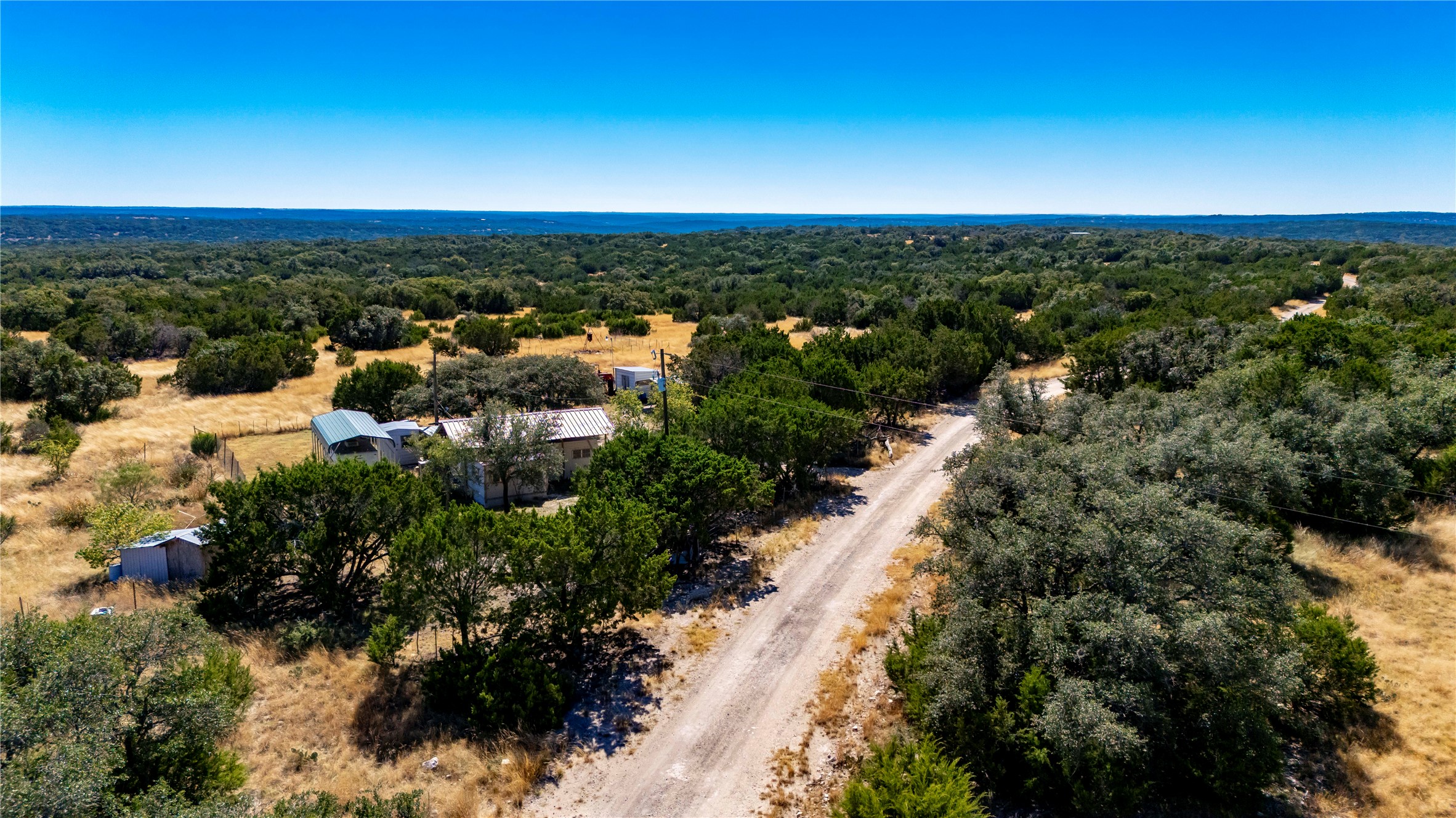 241 Sd 23200 Rocksprings, TX 78880 - Photo 28 of 49 an aerial view of residential houses with outdoor space