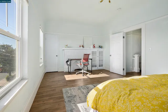 a bed room with a bed and table