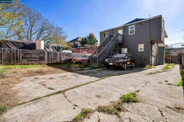 a car parked in front of a house