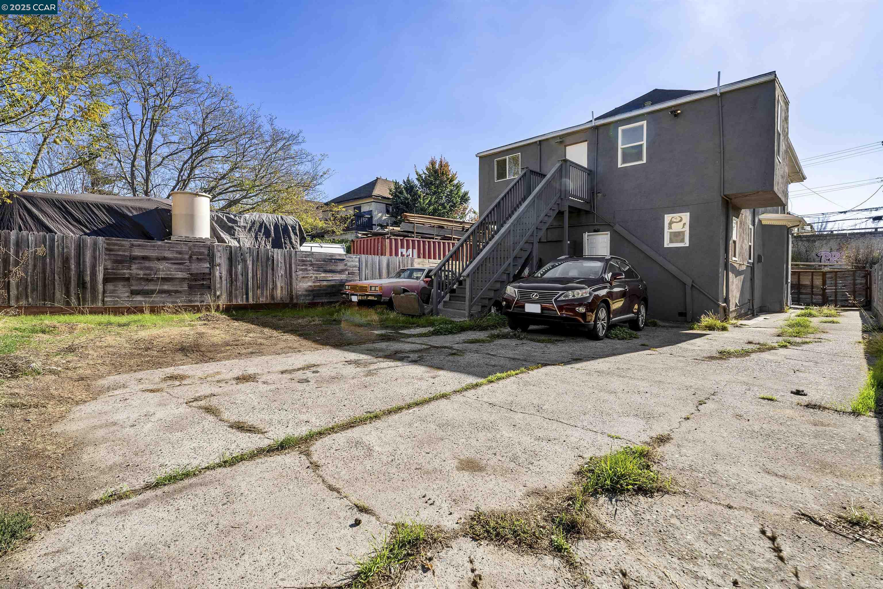 874 36th Street Oakland, CA 94608 - Photo 33 of 41 a car parked in front of a house