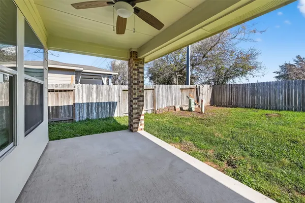 a view of backyard with green space