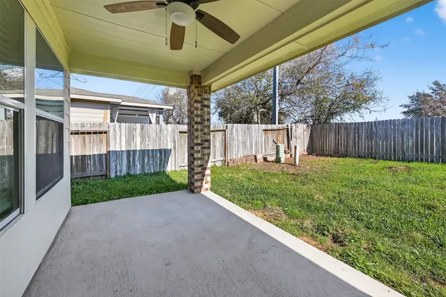 a view of backyard with green space