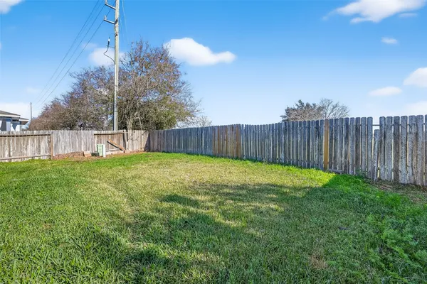 a view of a backyard with a garden