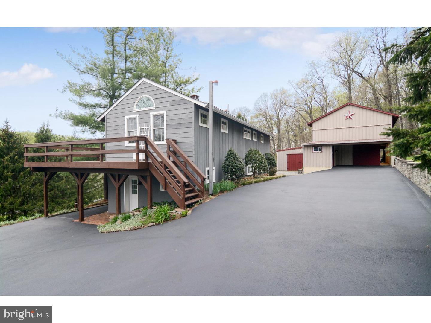 1226 Hollow Road Chester Springs, PA 19425 - Photo 22 of 25 a front view of a house with garden
