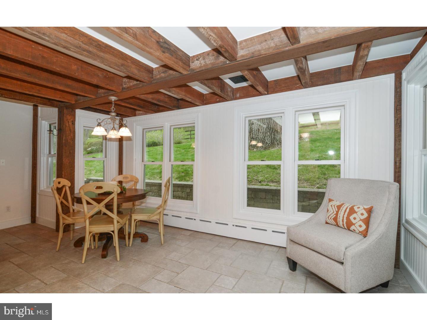 1226 Hollow Road Chester Springs, PA 19425 - Photo 6 of 25 a living room with furniture and large windows