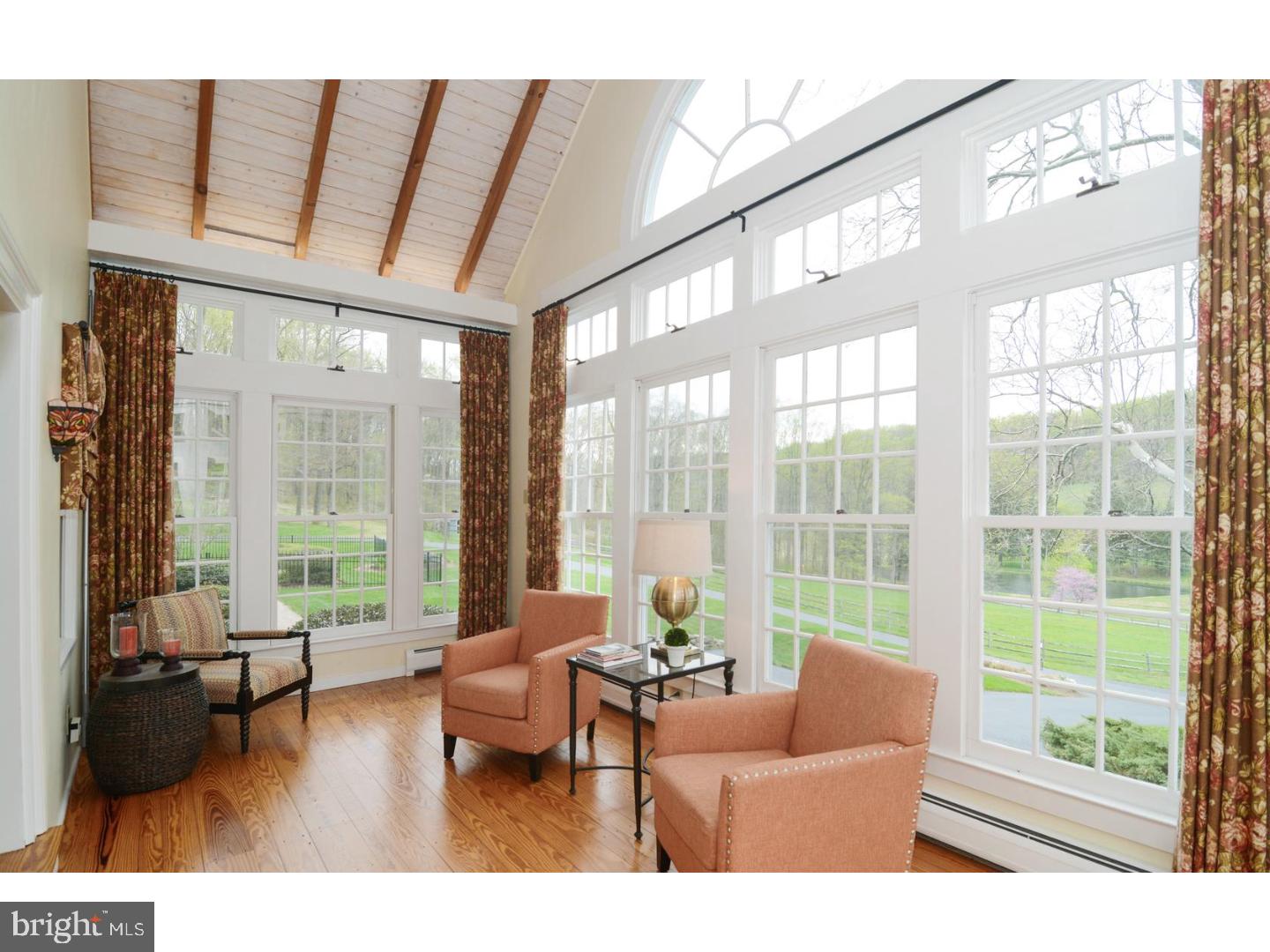 1226 Hollow Road Chester Springs, PA 19425 - Photo 8 of 25 a living room with furniture and a large window