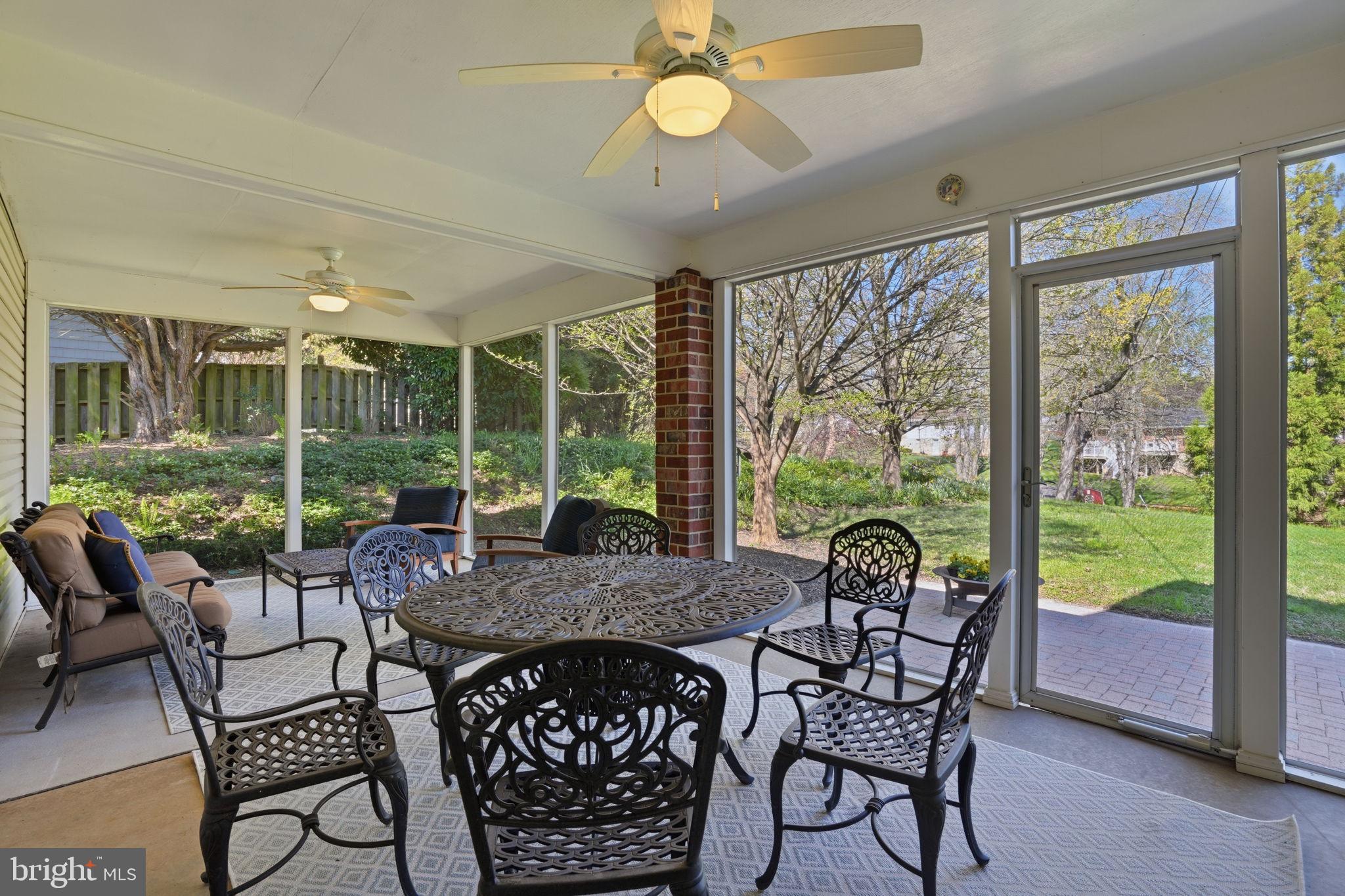 10208 Cabery Road Ellicott City, MD 21042 - Photo 11 of 24 Screened Porch overlooking Brick Patio and yard