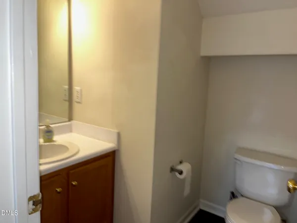 a bathroom with a sink and toilet
