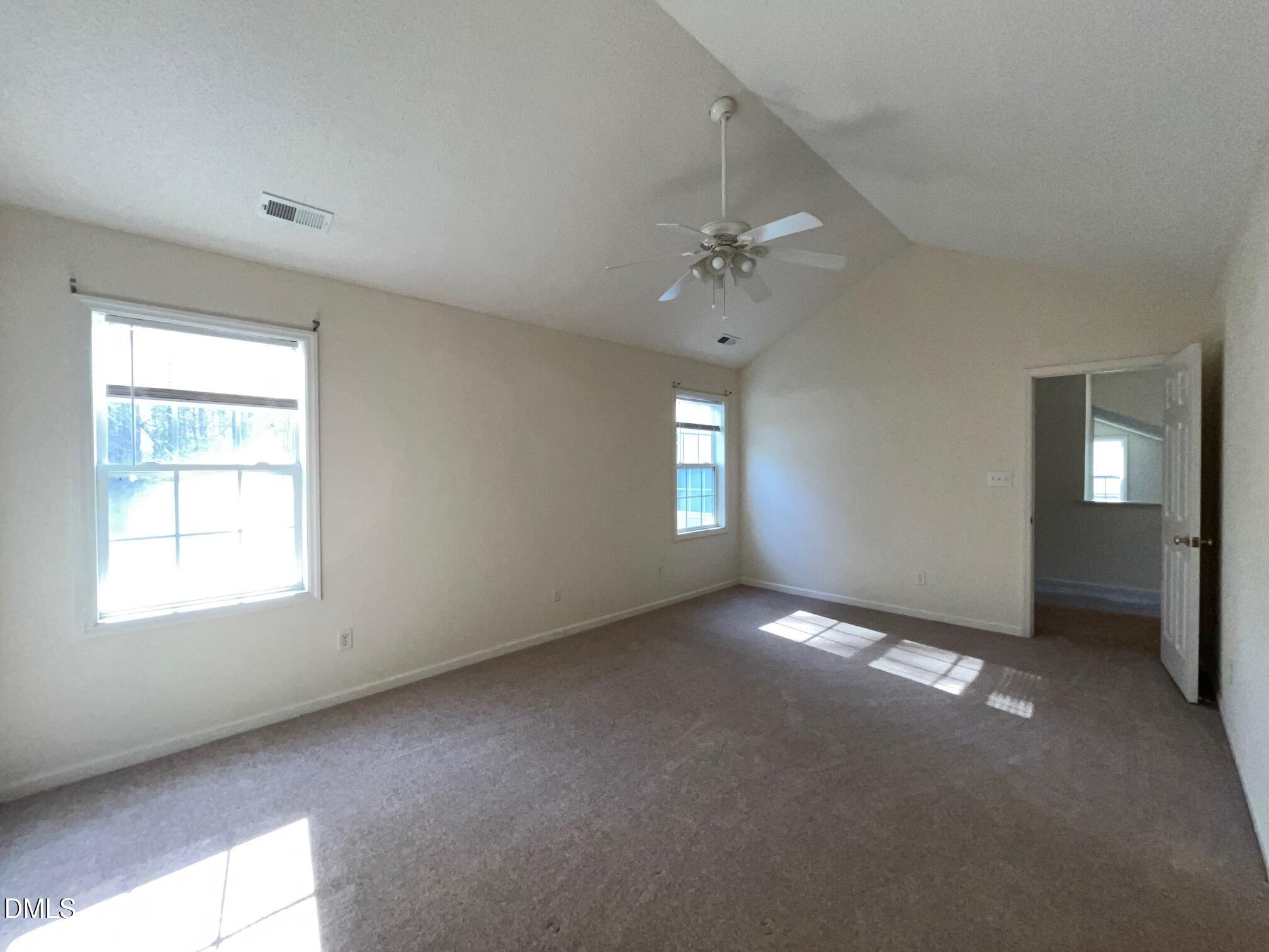 2604 Farlow Gap Lane Raleigh, NC 27603 - Photo 17 of 28 a view of an empty room with a window