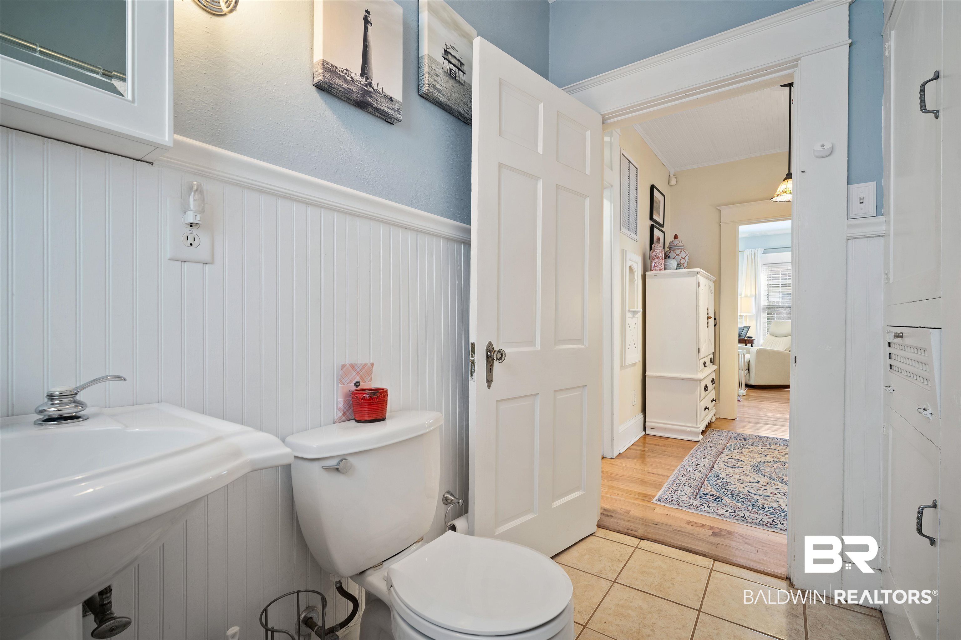 168 Mohawk Street Mobile, AL 36606 - Photo 22 of 31 Bathroom featuring a wainscoted wall and light tile patterned flooring