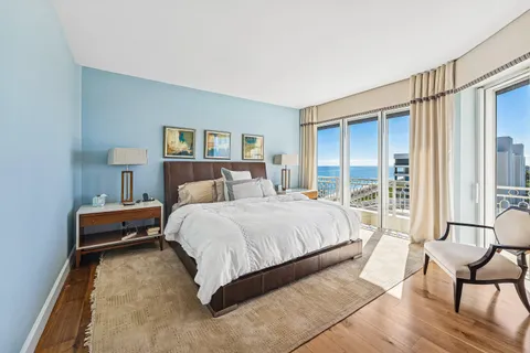 a bed room with a bed and a television