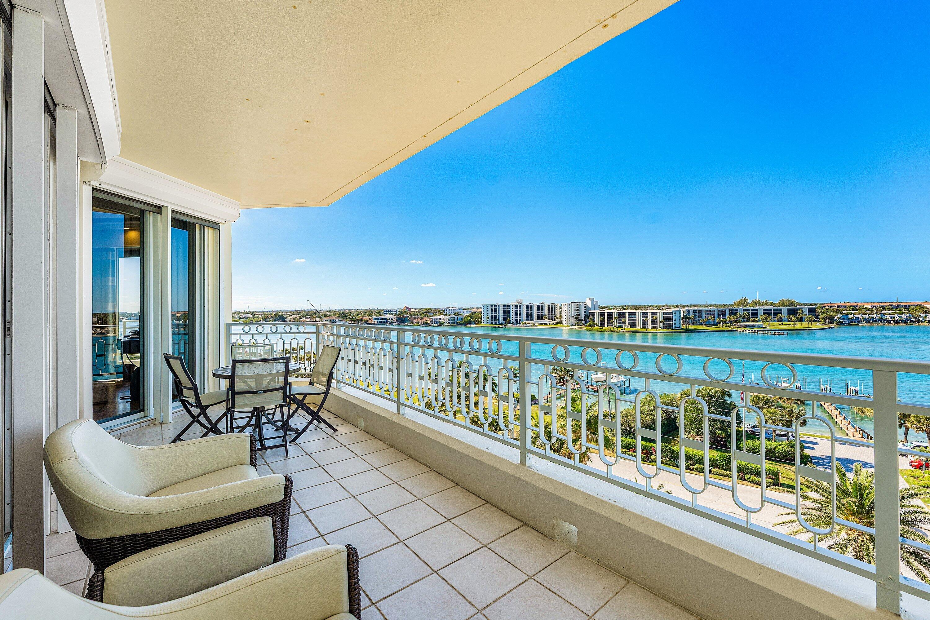 19950 South Beach Road, Unit 7S Jupiter, FL 33469 - Photo 30 of 40 a balcony with furniture and city view