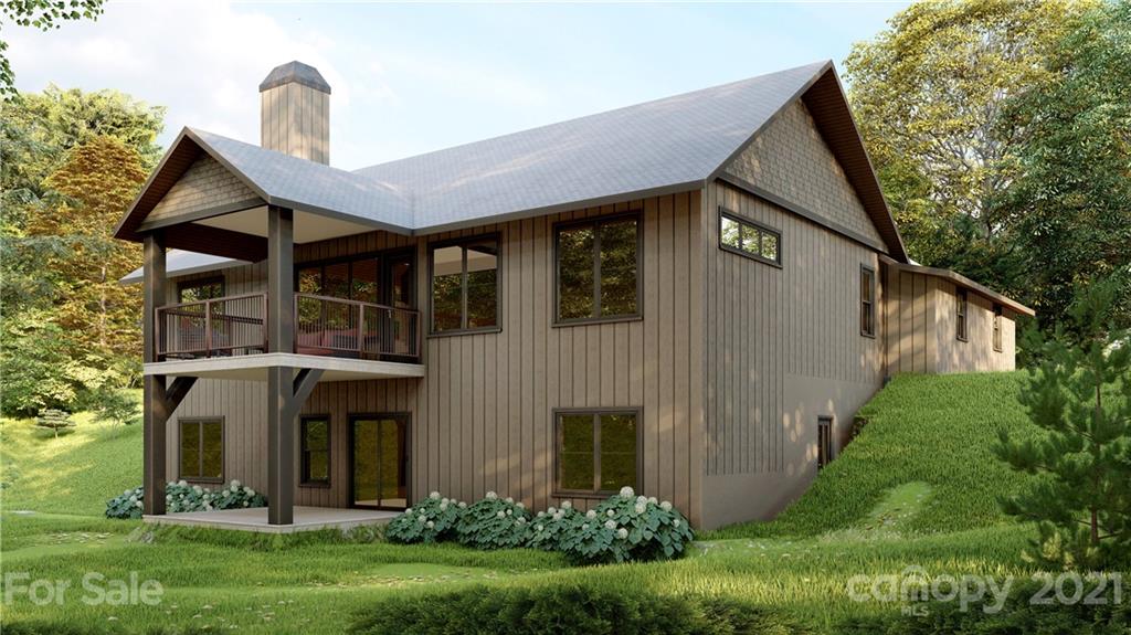 3 B Dragon Tail Drive, Unit 3B Brevard, NC 28712 - Photo 2 of 6 a front view of a house with garden