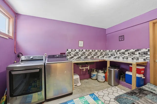 a view of livingroom with furniture and tv
