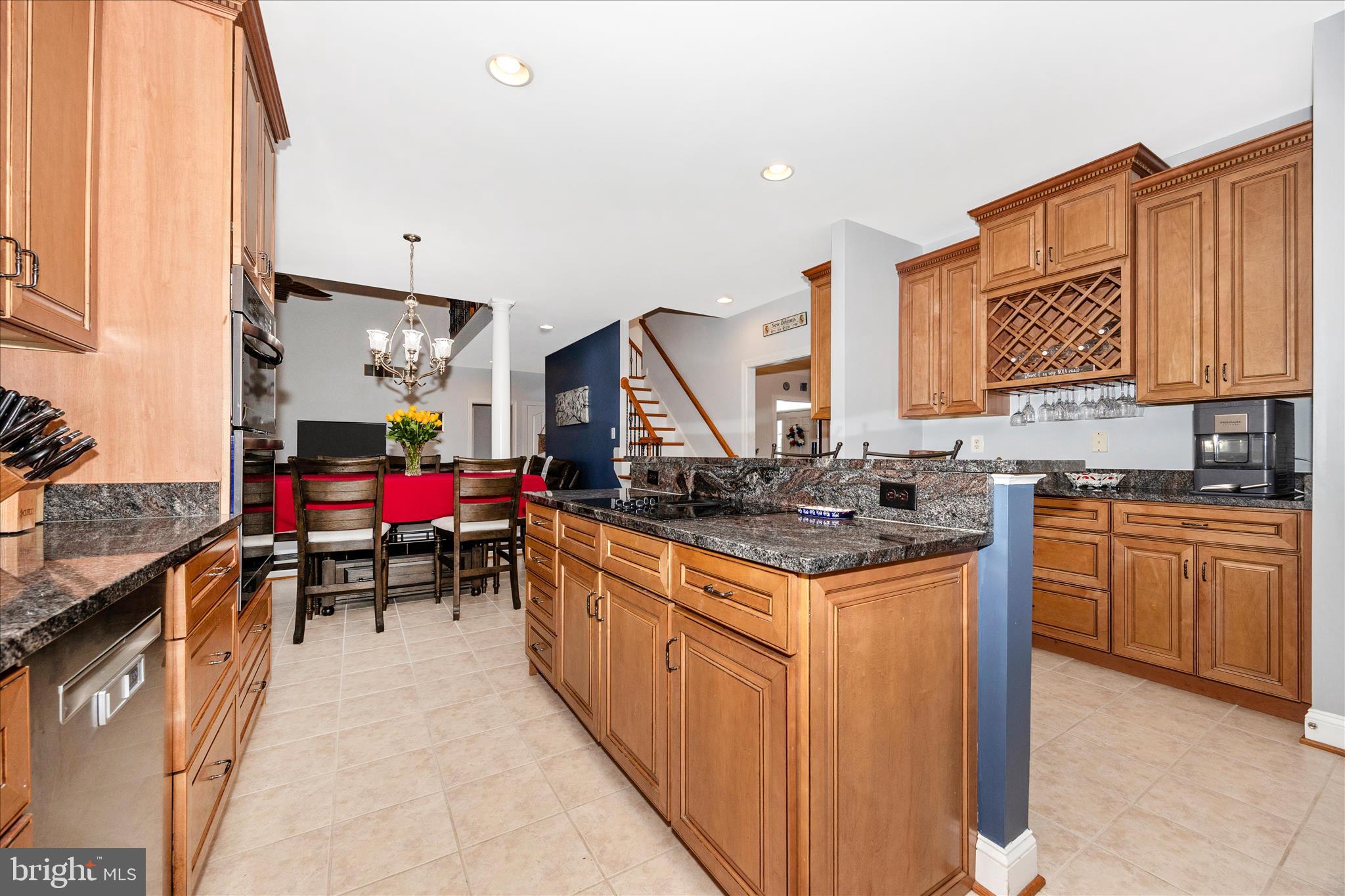 9855 McKinstry Mill Road New Windsor, MD 21776 - Photo 16 of 76 a kitchen filled counter top space a stove and a sink