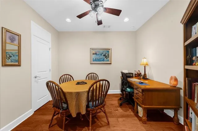 a dining room with furniture and window