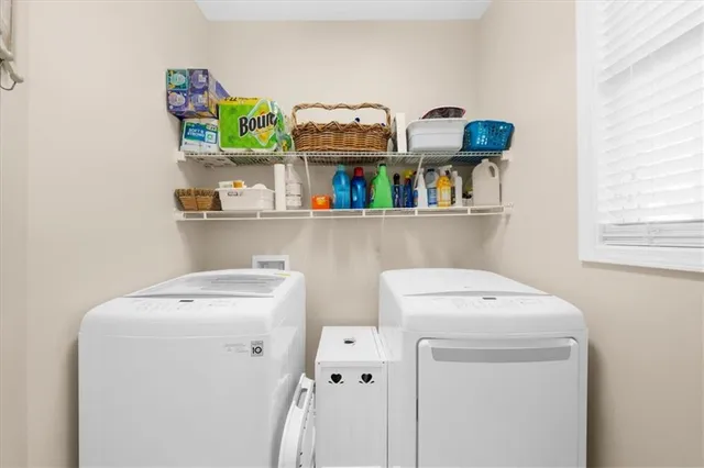a utility room with dryer and washer