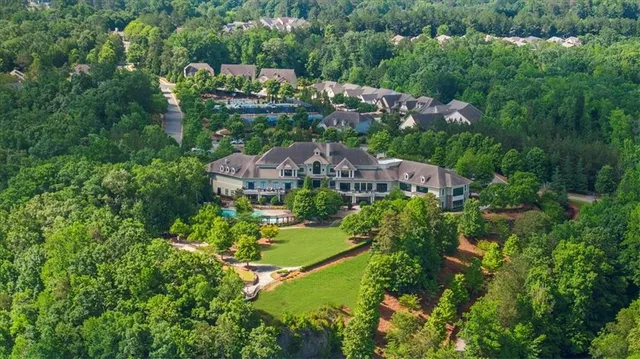 an aerial view of a house with a garden