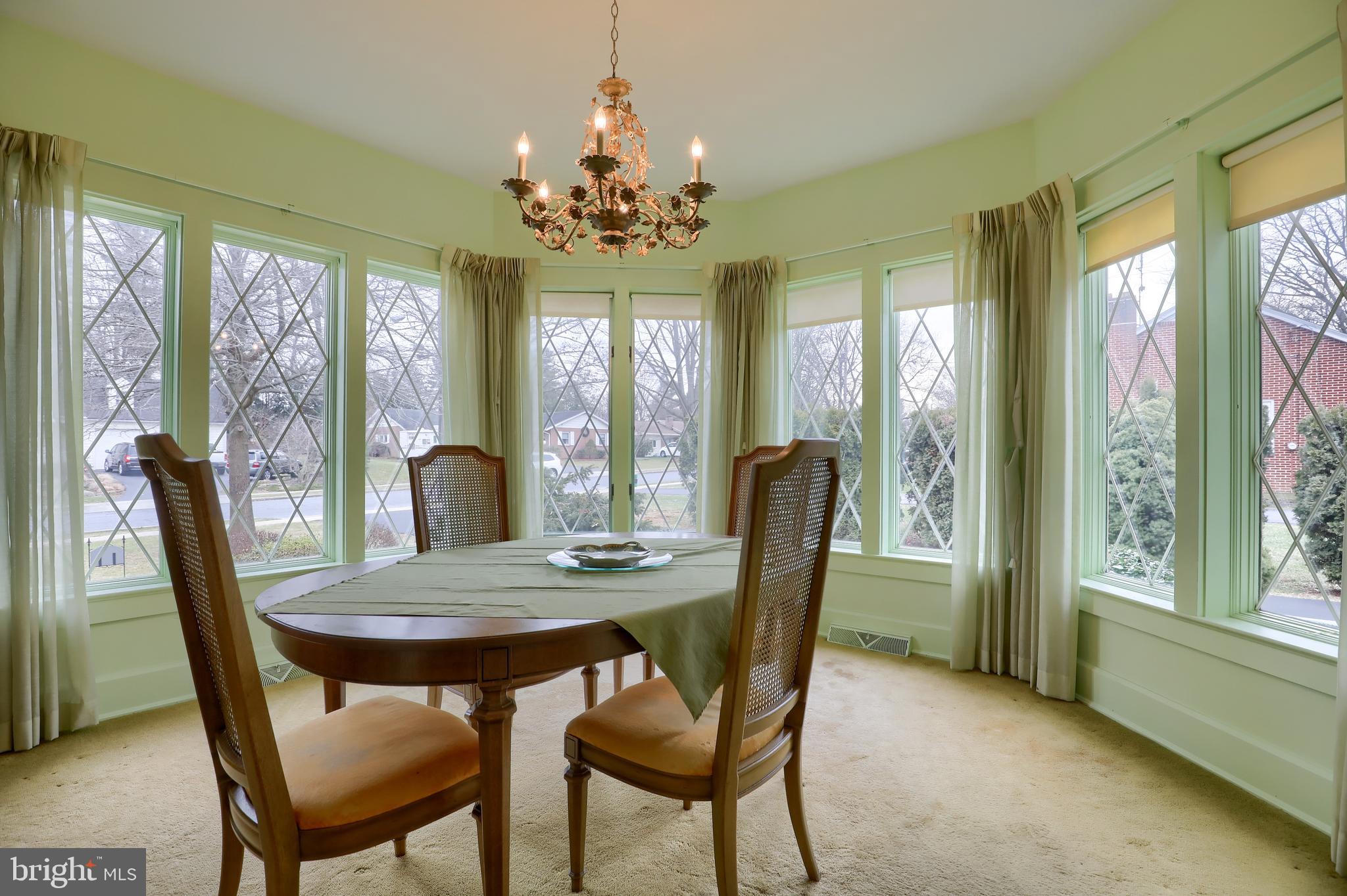 620 South Spruce Street Lititz, PA 17543 - Photo 21 of 57 a view of a dining room with furniture a chandelier and wooden floor
