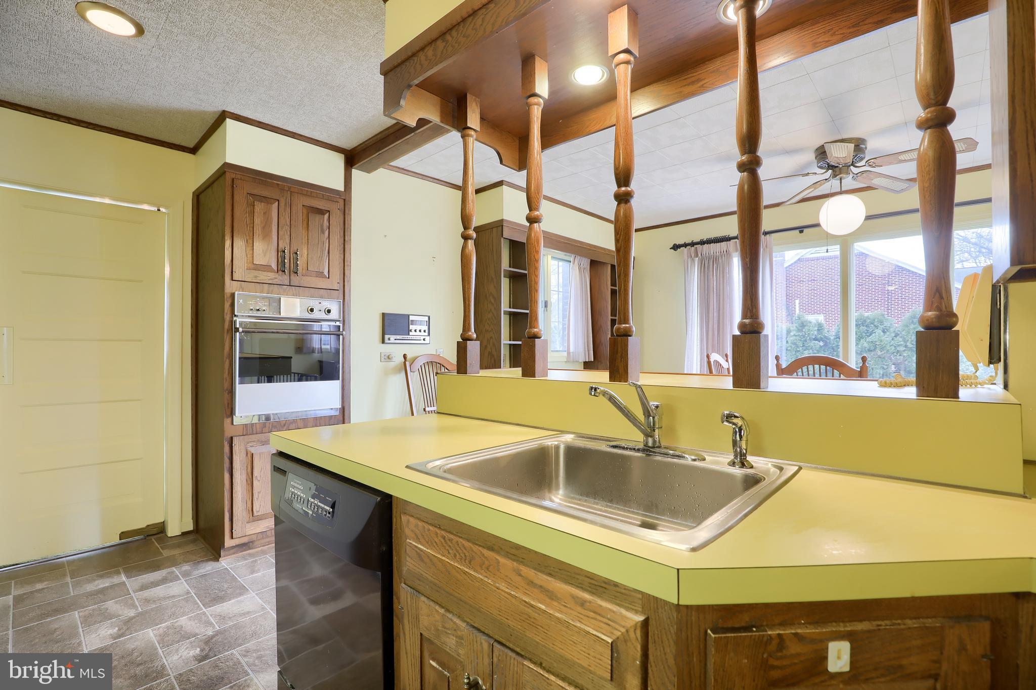 620 South Spruce Street Lititz, PA 17543 - Photo 25 of 57 a kitchen with a sink and a refrigerator