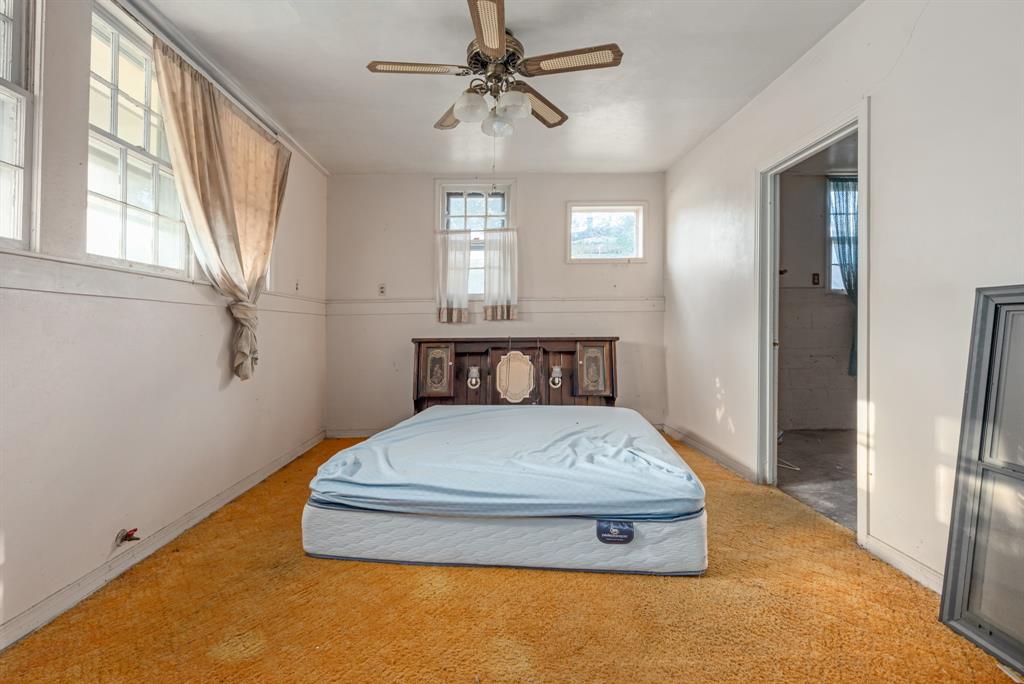 1089 Highway 22 Whitney, TX 76692 - Photo 13 of 26 Bedroom with carpet and a ceiling fan