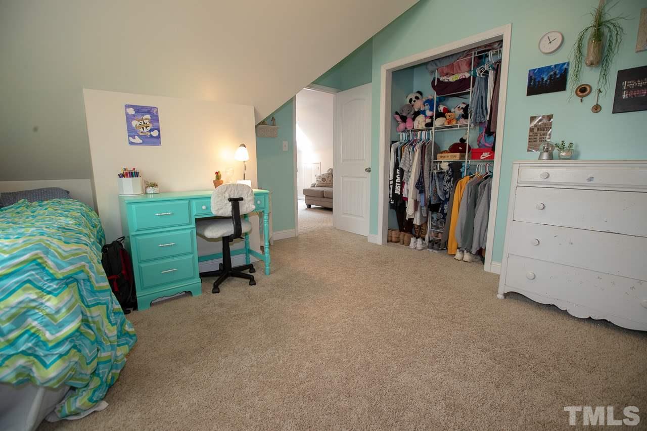 11213 Crestmont Drive Raleigh, NC 27613 - Photo 22 of 30 a view of a bedroom with baby crib