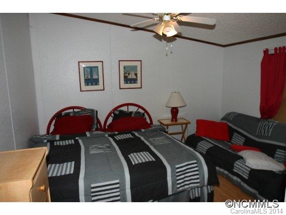 1298 Grassy Knob Road Rutherfordton, NC 28139 - Photo 15 of 18 a bedroom with a bed and dresser
