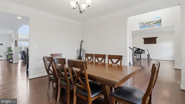 a living room with furniture fireplace and flat screen tv