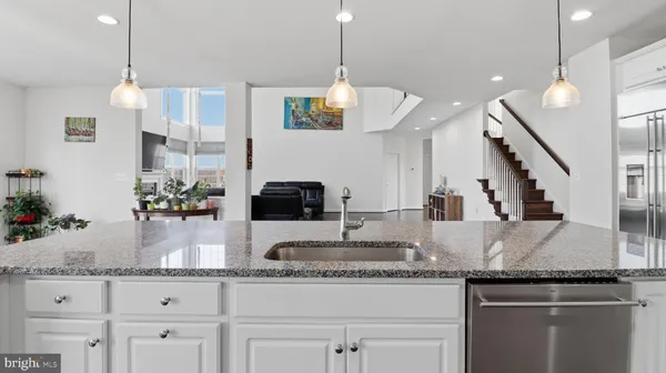 a bathroom with a bathtub and a sink