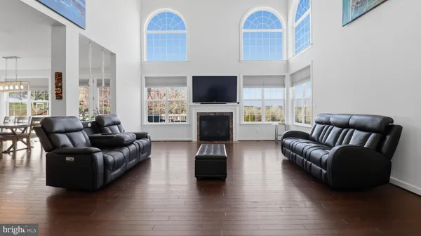 a bathroom with a toilet and shower curtain