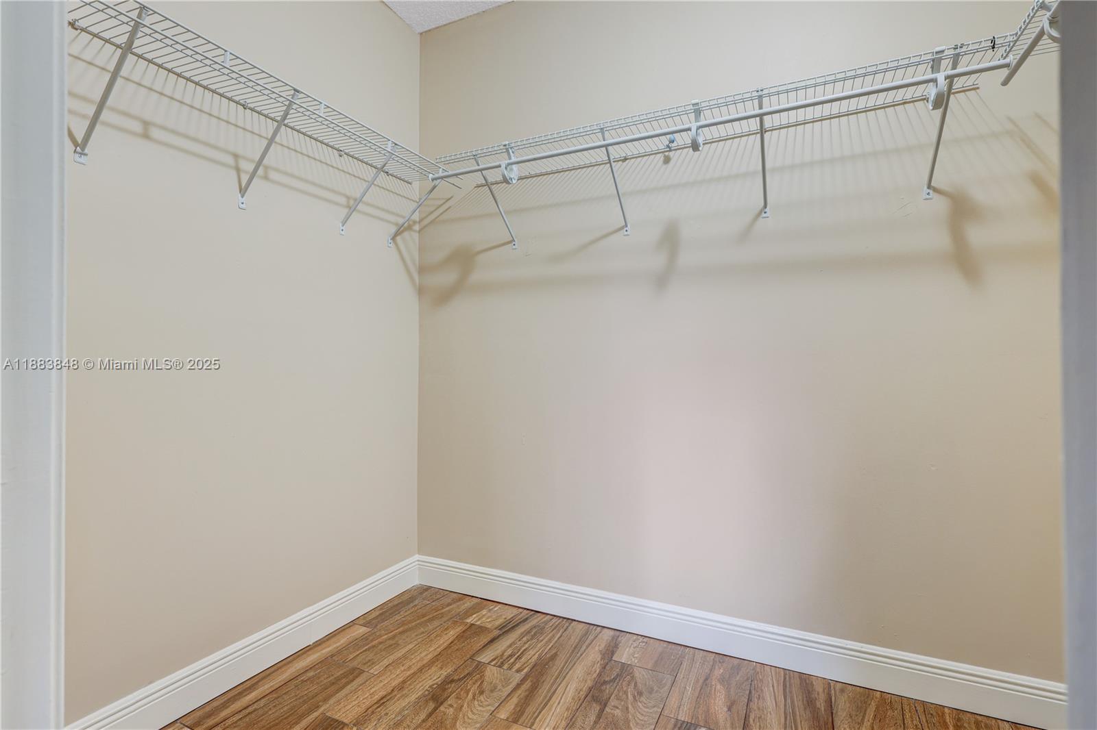 7627 East Stonecreek Circle Davie, FL 33024 - Photo 15 of 29 a view of a room with racks on the wall