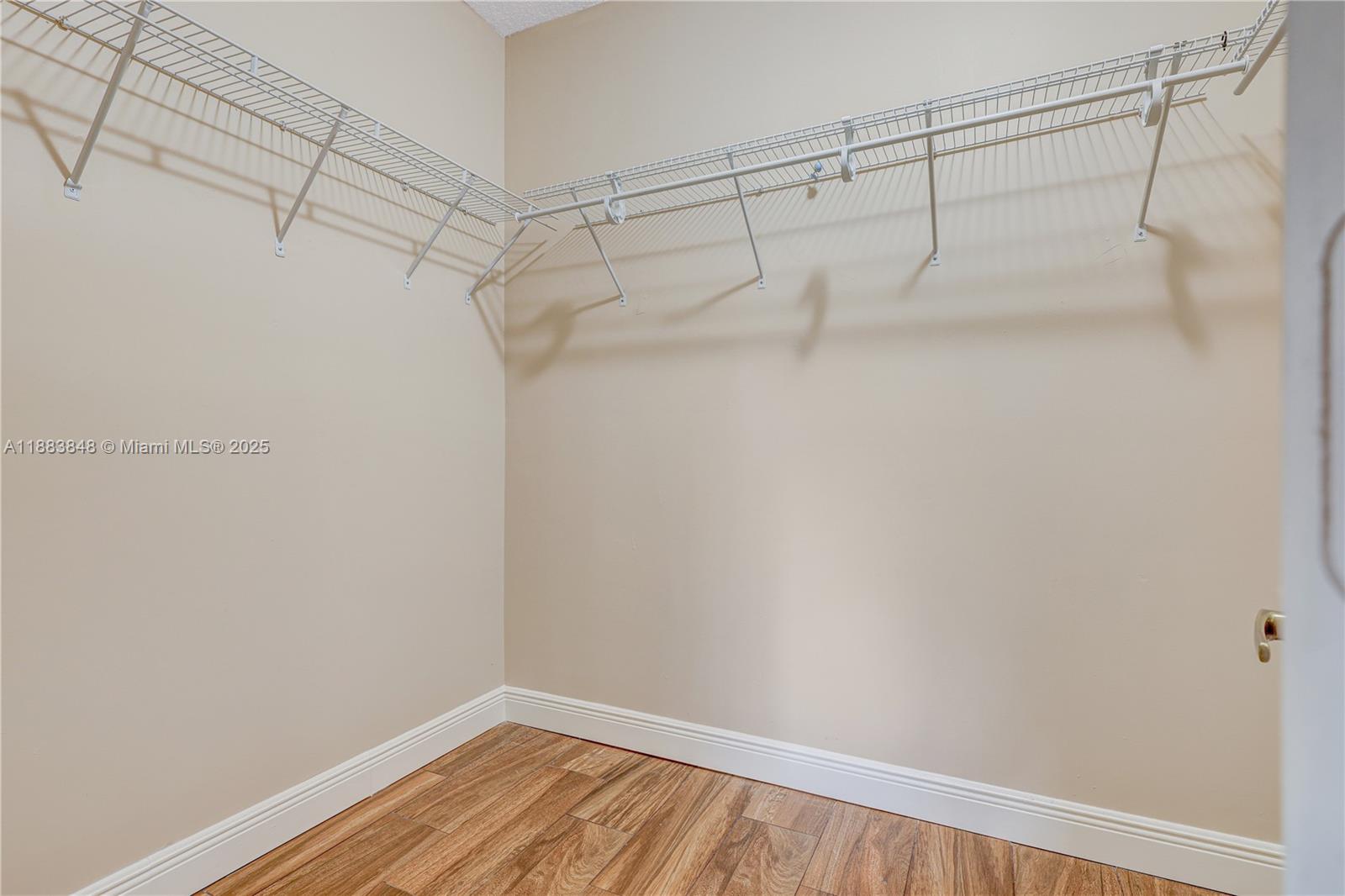 7627 East Stonecreek Circle Davie, FL 33024 - Photo 16 of 29 a view of a room with racks on the wall