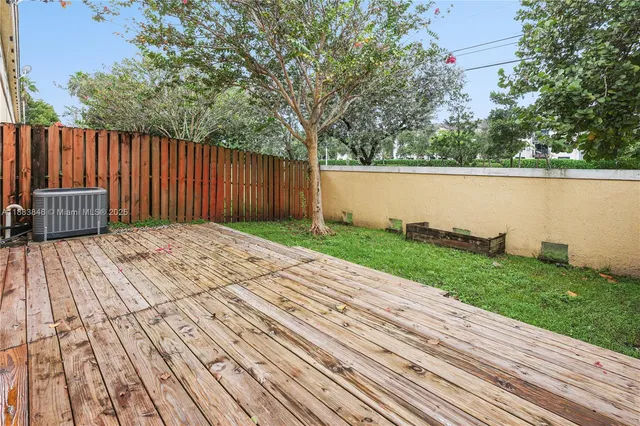 a view of a terrace with a garden