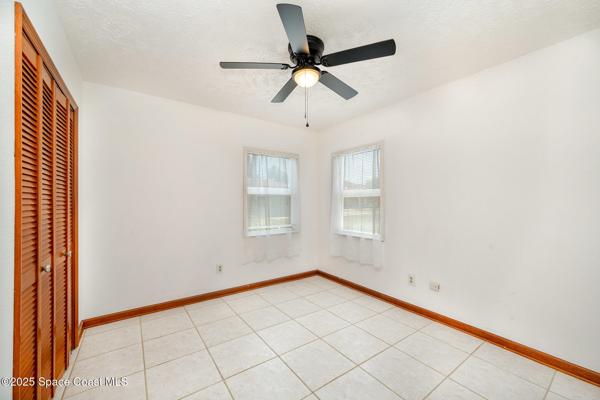 121 Del Flora Indialantic, FL 32903 - Photo 13 of 15 a view of an empty room and window