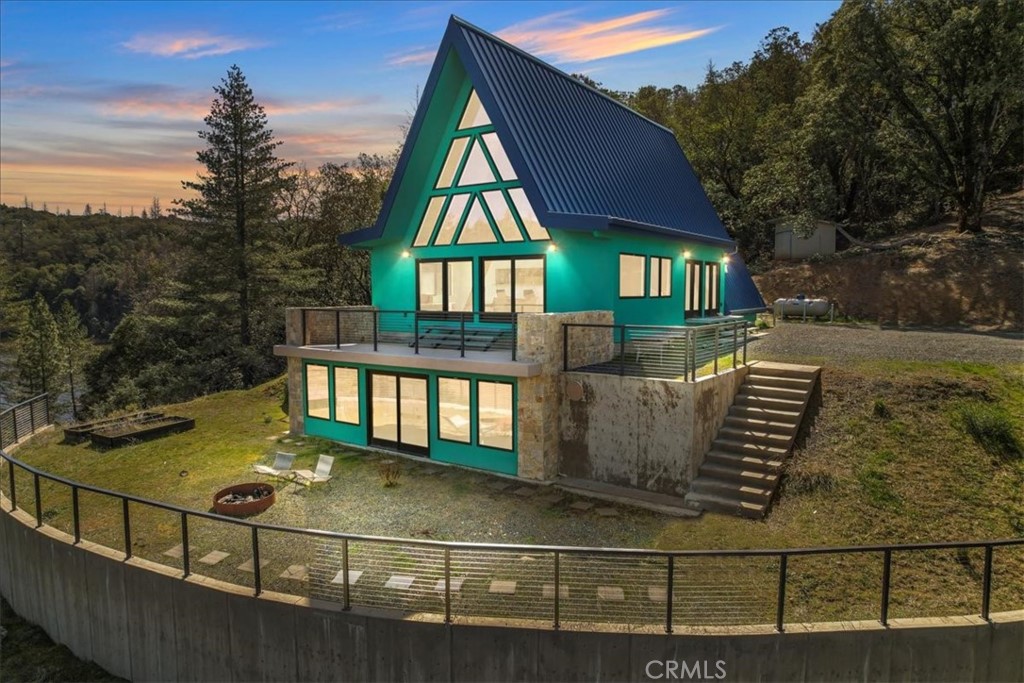 3561 Benmore Valley Road Hopland, CA 95449 - Photo 1 of 1 a view of a brick house with iron fence