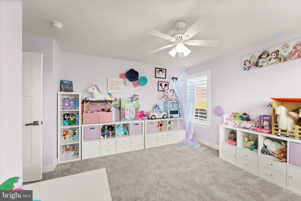 a room with furniture and wooden floor